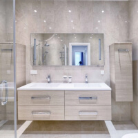 true form construction modern bathroom with a spacious shower and dual sinks